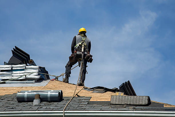 Professional Roofing technician working in Kerby, OR
